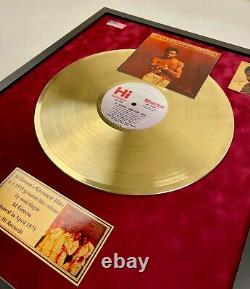 Al Green Greatest Hits Gold Vinyl Record In Frame On Red Velvet Background
