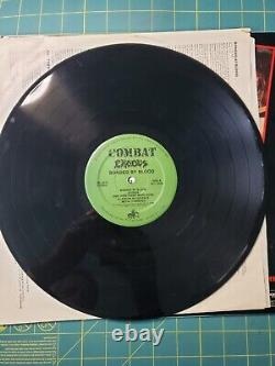 EXODUS Bonded By Blood LP vinyl Combat Records MX 8019 green labels Torrid