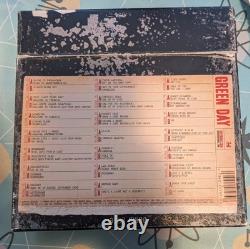 Green Day Ultimate Collectors Box Set 7 45 used, lid ripped otherwise good
