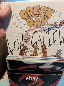 Green Day Ultimate Collectors Box Set 7 45 used, lid ripped otherwise good